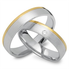 🦚 Trauringe 333er Gelb- Weissgold mit Diamant