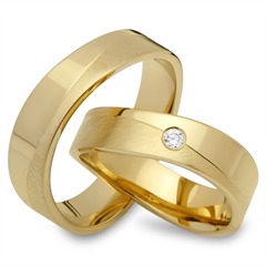 🦚 Trauringe 333er Gelbgold mit Brillant