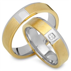 🦚 Trauringe 333er Gelb- Weissgold mit Diamant