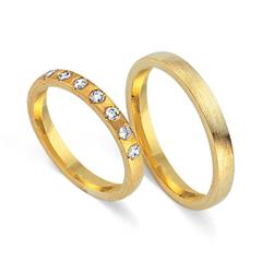 🦚 Eheringe 585er Gelbgold 7 Diamanten
