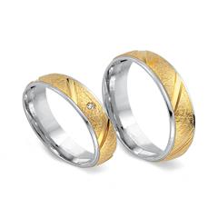 🦚 Trauringe 333er Gelb- Weissgold mit Diamant