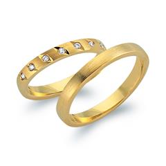 🦚 Eheringe 750er Gelbgold 7 Diamanten